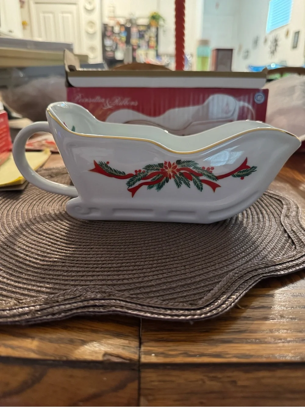 Classic White Ceramic Holiday Sleigh with Red & Green Ribbon Accents